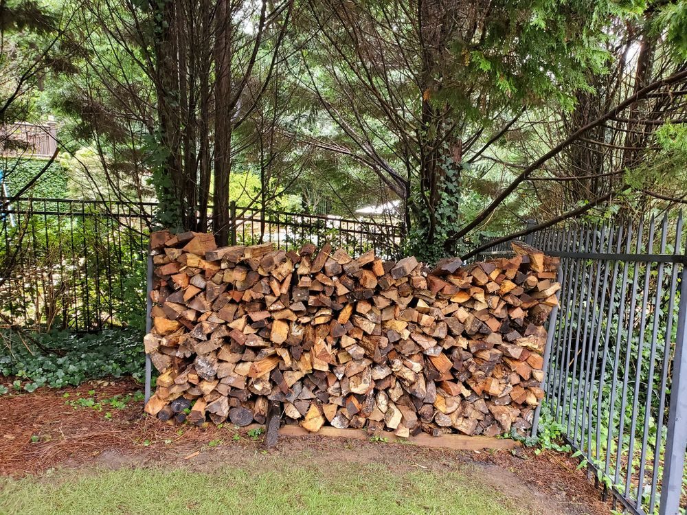 Seasoned firewood stacked for delivery