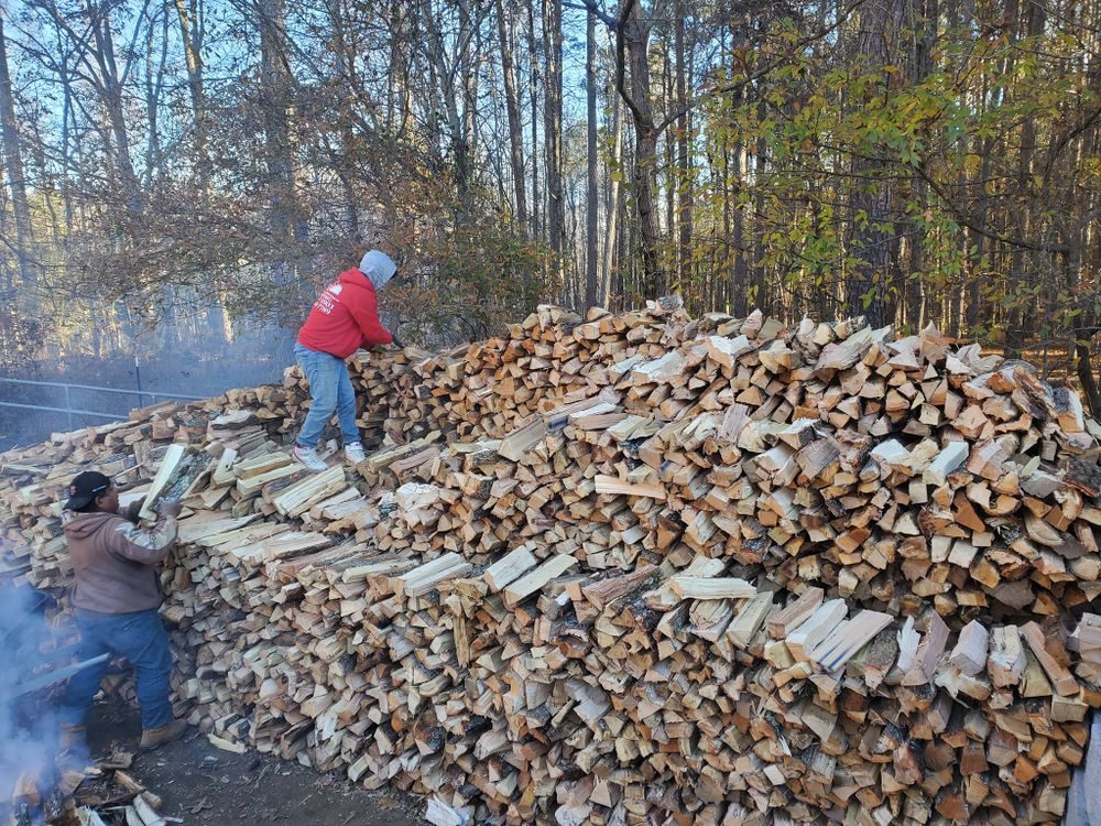 Seasoned firewood stacked for delivery